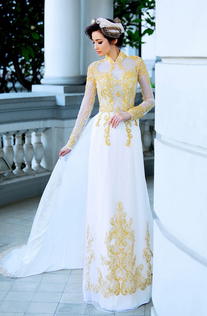 Truc Diem duyen dang voi ao dai ren trang hinh anh 3