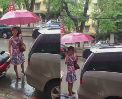 nguoi phu nu do o to sai truoc cua hang con thach thuc 