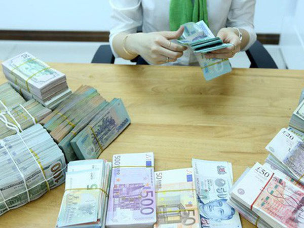 Việt Nam xuất siêu lớn, tỷ giá USD/VND hạ nhiệt nhanh