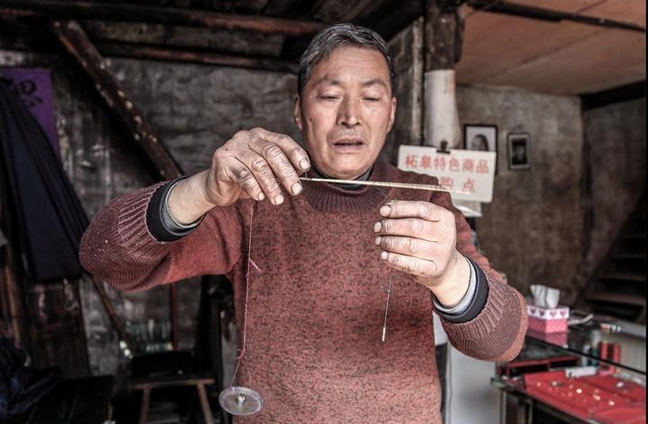 Cân tiểu li từ thời nhà Thanh là báu vật gia truyền của gia đình Xia.