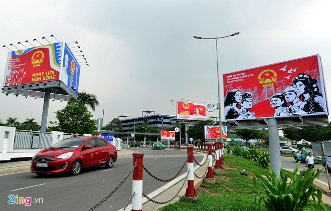 Ha Noi, TP HCM truoc ngay bau cu dai bieu Quoc hoi, HDND hinh anh 10