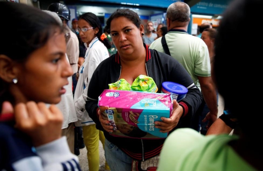 Venezuela: Sieu thi trong, giay ve sinh gia 30 USD mot cuon hinh anh 13