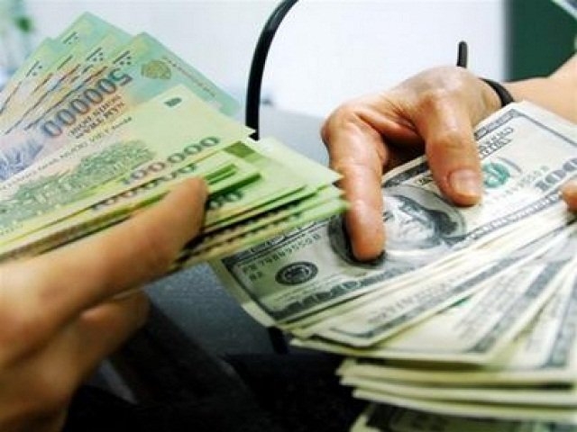 ty gia usd/vnd “mien nhiem” voi con sot vang hinh anh 1