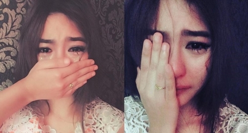 Bất ngờ với gương mặt thật của cô gái vừa che mặt vừa khóc - Ảnh 2