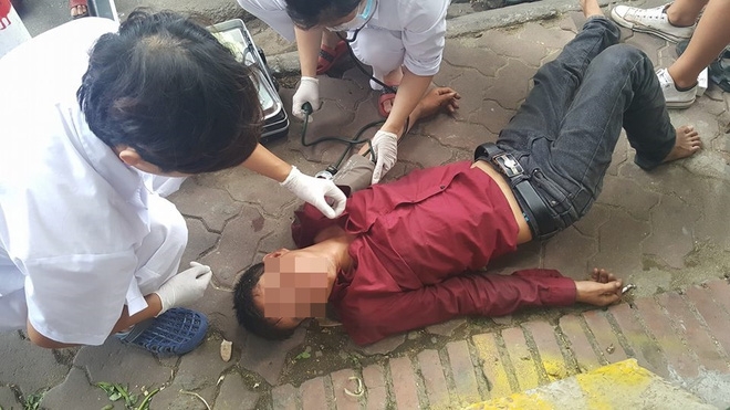 Người đàn ông nằm ăn vạ giữa đường Cát Linh, Hà Nội - Ảnh 5.