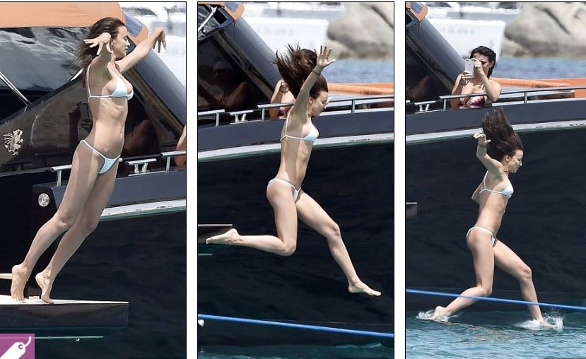 irina shayk dien bikini nho xiu, goi cam ben nguoi tinh hinh anh 3