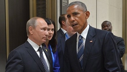 Tổng thống Nga Putin (trái) và người đồng cấp Mỹ đã có cuộc hội đàm kéo dài hơn 1 giờ đồng hồ tại Trung Quốc. Ảnh: RIA Novosti