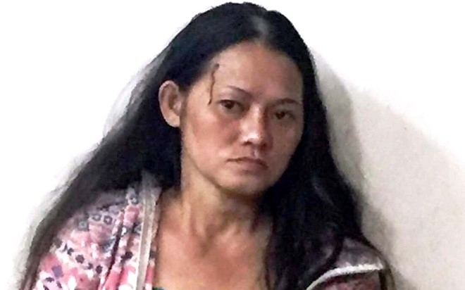 Nguoi phu nu nghien chem bi thuong 4 bao ve dan pho hinh anh 1