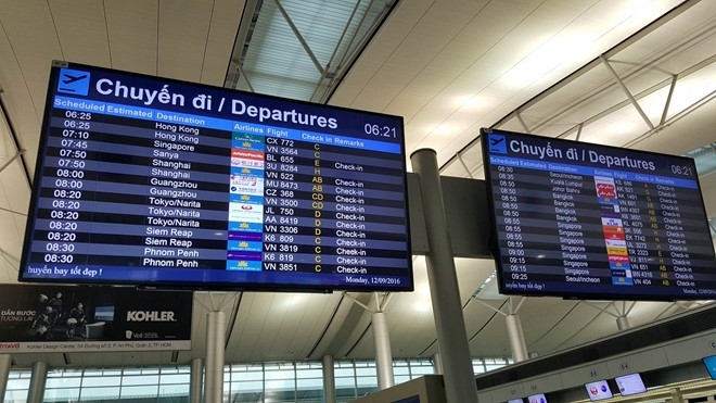 Tan Son Nhat gap su co, hanh khach phai check in thu cong hinh anh 1