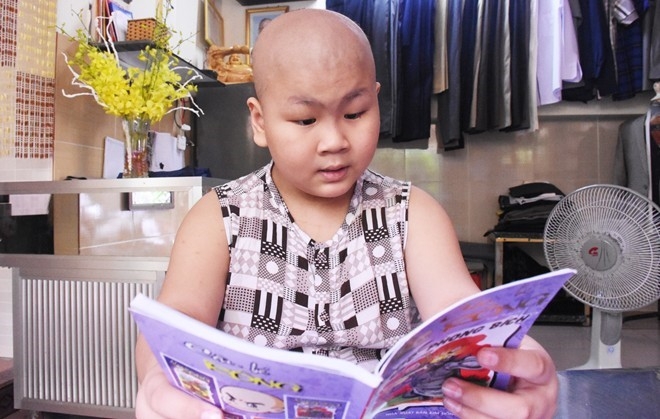 Cau be ung thu uoc mo lam CSGT o Da Nang qua doi hinh anh 1