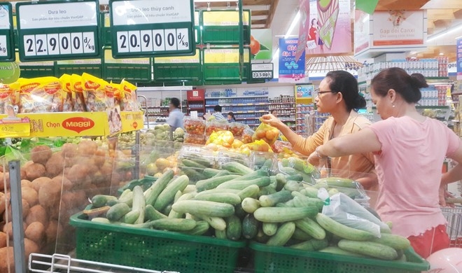 Sieu thi keu goi khach hang chi mua 2 kg ca chua mot ngay hinh anh 1
