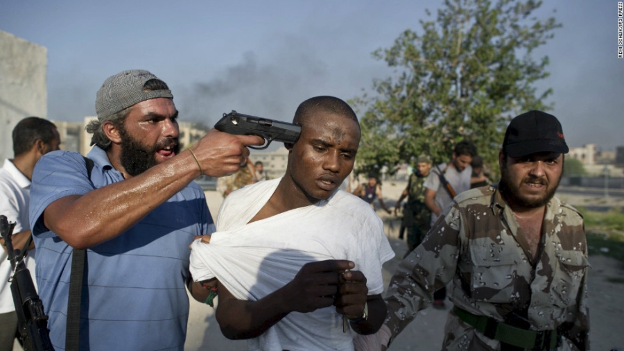 vi mot con khi, 16 nguoi bi giet chet o libya hinh anh 1