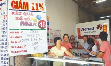 Phia sau man trao thuong xo so 71 ty dong hinh anh 1