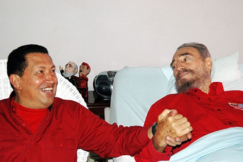 [Caption]Venezuelan President Hugo Chavez (L) visits his then Cuban counterpart Fidel Castro in Havana in this August 13, 2006 file photo. REUTERS/Estudios Revolucion-Granma/Handout/File Photo ATTEN
