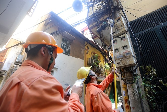 Thiết bị công tơ điện tử công nghệ mới sẽ thay thế việc ghi số điện bằng cách thủ công /// Ảnh: Ngọc Thắng