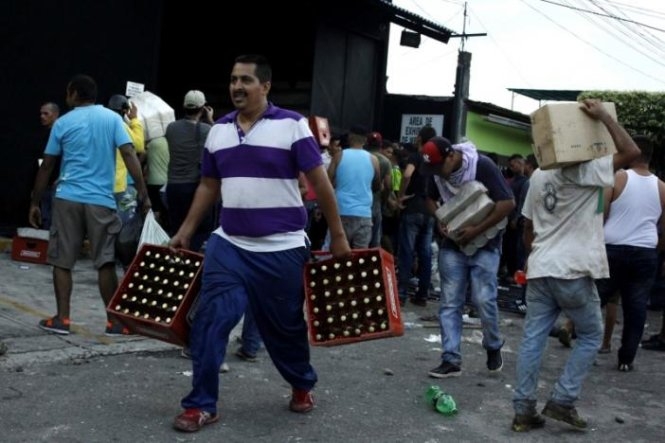 ​Venezuela bắt giữ hàng trăm người trong khủng hoảng đổi tiền 