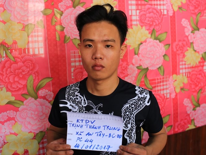 Nghi can Trung lúc bị bắt /// Ảnh: ĐỖ TRƯỜNG