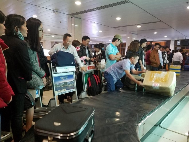 485 chuyen bay bi cham gio trong 6 ngay Tet hinh anh 1