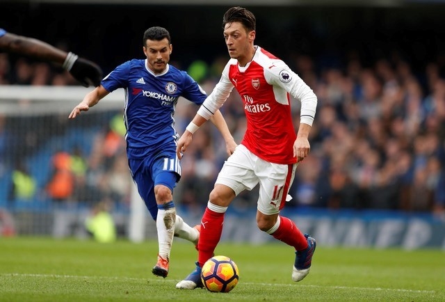 Sao Arsenal gap hoa vi bam thich status 'Wenger Out' hinh anh 2