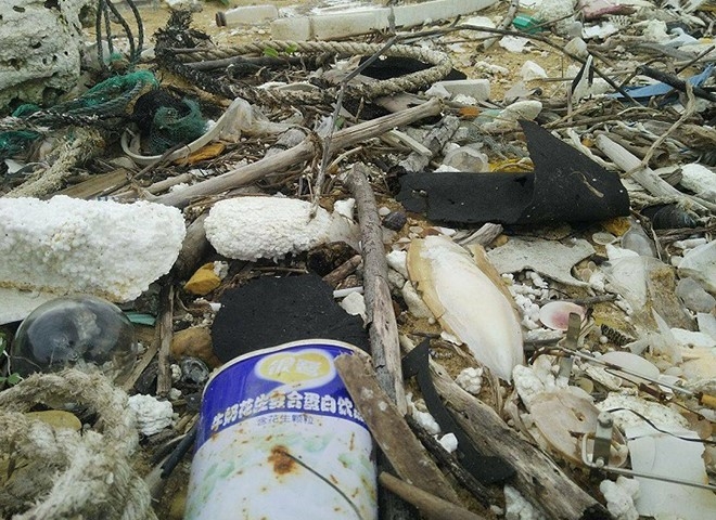 Dau von cuc, chai lo chu Trung Quoc dat suot 7 km bo bien hinh anh 1