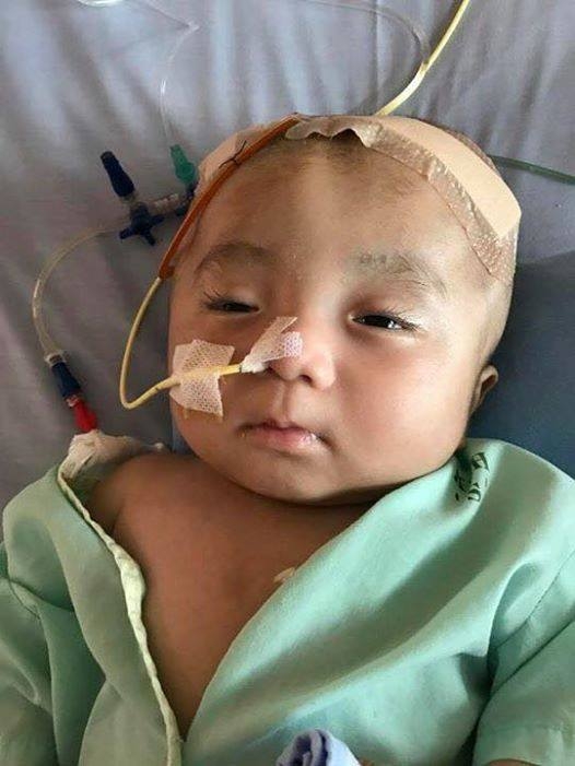 Bé trai bị não úng thủy nặng đã về đến chùa Vạn Đức: “Cầu mong kỳ tích xảy ra với Đức Lộc” - Ảnh 1.