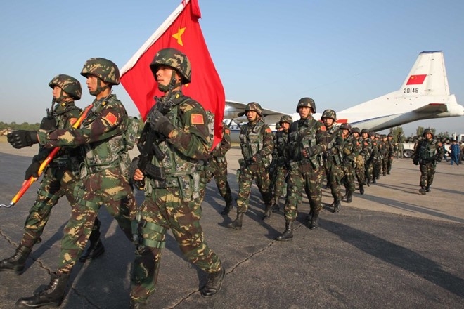 Trung Quoc giai tan 5 trong so 18 quan doan chu luc hinh anh 1