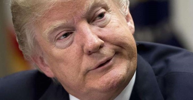 Ty le ung ho Trump giam sau sau 2 thang cam quyen hinh anh 1