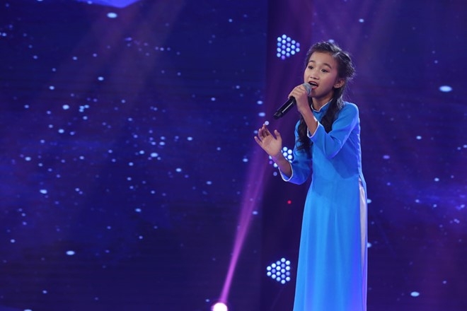 Be 9 tuoi duoc Quang Linh vi la 'ban sao nhi' Tung Duong hinh anh 5
