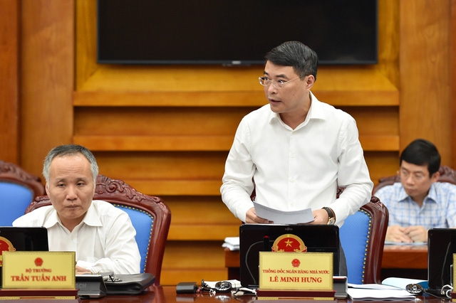  Thống đốc NHNN Lê Minh Hưng trình bày về dự án Luật tại phiên họp. - Ảnh: VGP/Nhật Bắc 