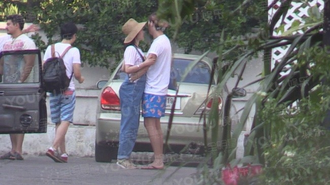 Anh hau Trung Quoc cap trai tre va chong cong khai ly hon hinh anh 2