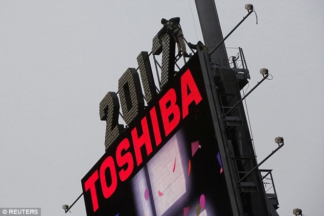 Toshiba: Them mot tuong dai cong nghe Nhat Ban co the sup do hinh anh 1