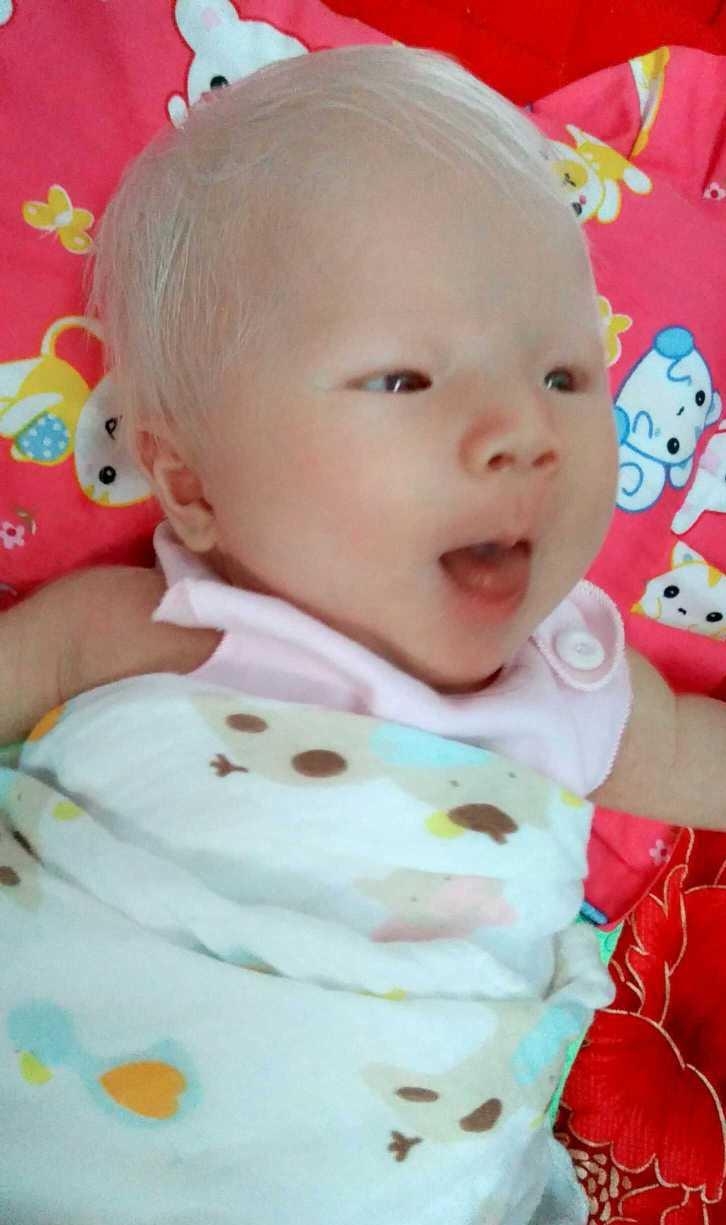sinh con da trang nhu 