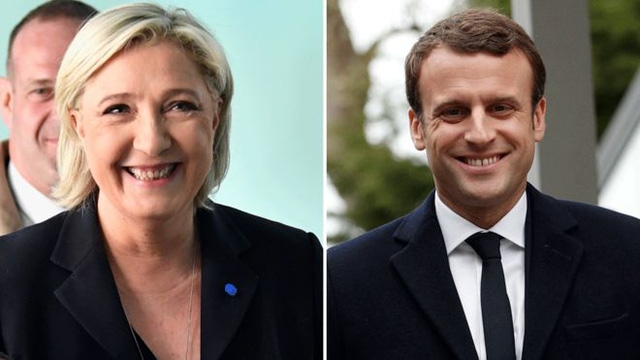 Ứng viên tổng thống Marine Le Pen (trái) và ứng viên Emmanuel Macron (Ảnh: AFP)