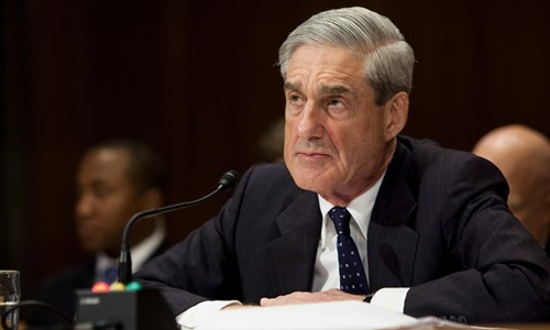 Cựu giám đốc FBI Robert Mueller trong phiên điều trần trước Thượng viện năm 2013. Ảnh: New York Times.