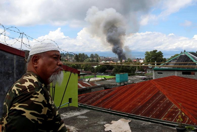  Chiến dịch giải phóng Marawi tiến triển chậm do nhiều dân thường vẫn bị mắc kẹt hoặc bị phiến quân bắt giữ làm con tin. (Ảnh minh họa: Reuters) 