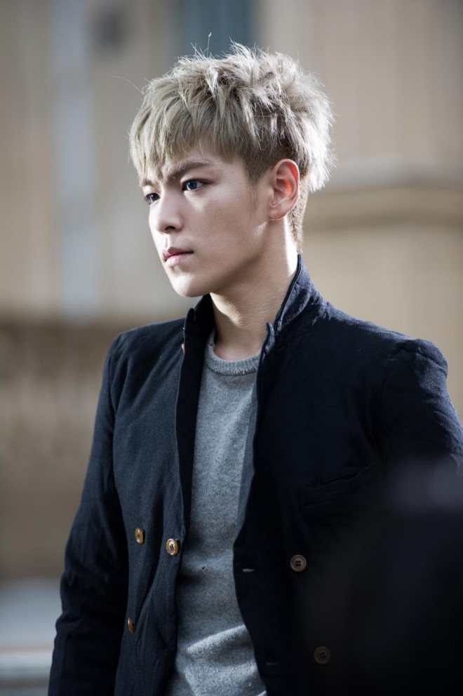 Toa an cong bo ngay T.O.P (Big Bang) ra toa du anh dang hon me hinh anh 1