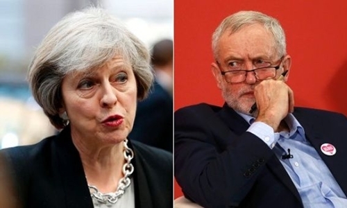 Bà Theresa May (trái) và ông Jeremy Corbyn. Ảnh: Reuters.