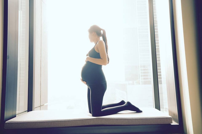 Á hậu Kiều Khanh khoe bụng bầu lớn sau gần 4 tháng kết hôn - Ảnh 1.
