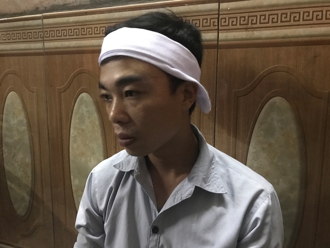 Mẹ già ôm di ảnh con trai bị chém rời thi thể gào khóc trong đám tang - Ảnh 5.