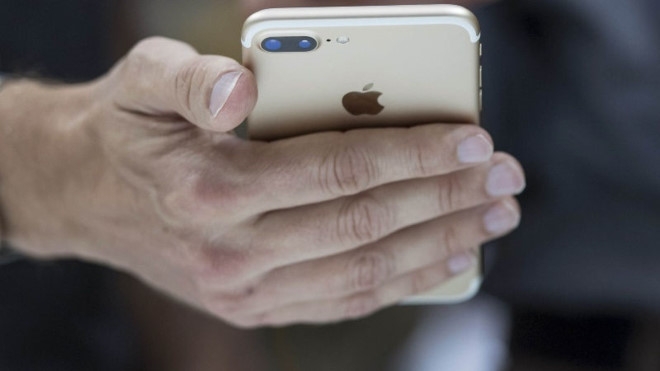 Mau thuan len cao, Qualcomm muon cam ban iPhone tai My hinh anh 1