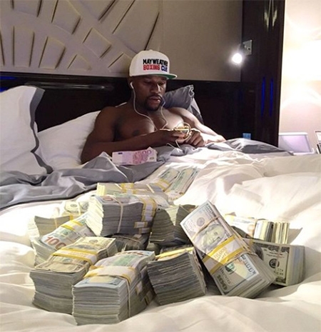 mayweather-so-gang-mcgregor-de-kiem-tien-tra-no