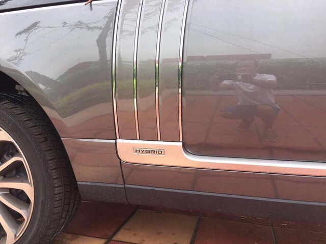 Range Rover SVAutobiography Hybrid đầu tiên được đưa về nước - Ảnh 4.