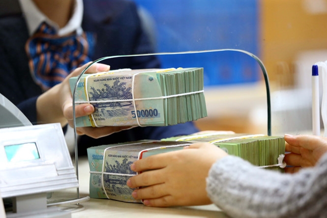 Tháo “cục máu đông” nợ xấu, lãi suất sẽ có cơ hội giảm sâu /// Ảnh: Ngọc Thắng