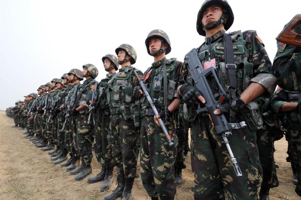 linh tq tien sau 1km vao lanh tho tranh chap trung-an hinh anh 1