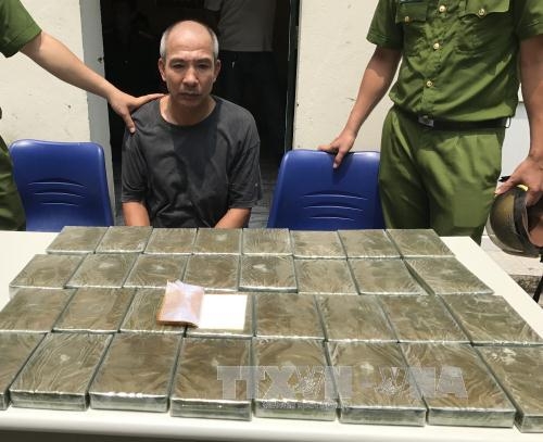 vu bat trum ma tuy o tram thu phi: phat hien them 32 banh heroin hinh anh 2