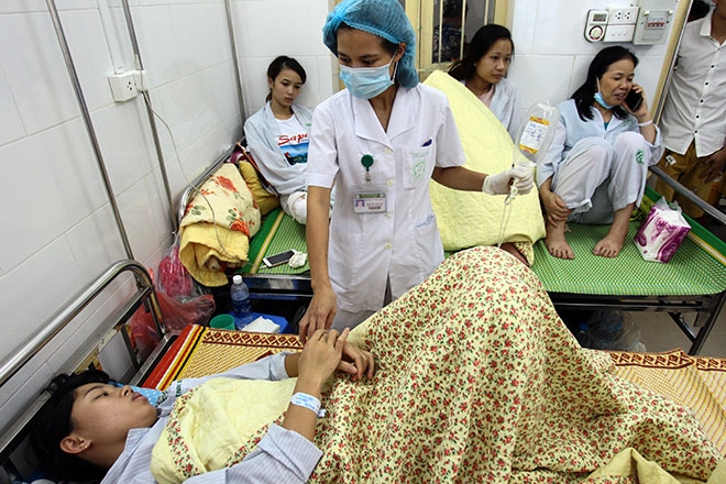 Nữ điều dưỡng mang thai sắp đẻ vẫn căng mình chống sốt xuất huyết - 11
