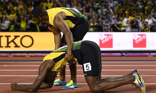 usain-bolt-nga-guc-tren-duong-chay-cuoi-cung-2