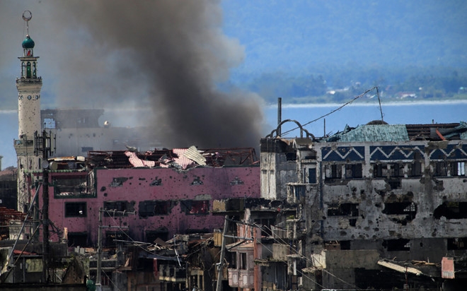 Quan doi Philippines bi phu nu va tre em ban o Marawi hinh anh 1