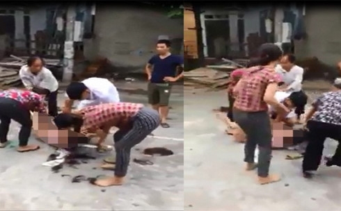 Xac dinh 5 nguoi danh ghen, lot do co gai tre giua duong hinh anh 1