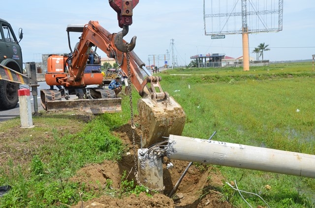 Tại sao hàng nghìn trụ điện trung thế gãy đổ trong bão số 10? - Ảnh 11.